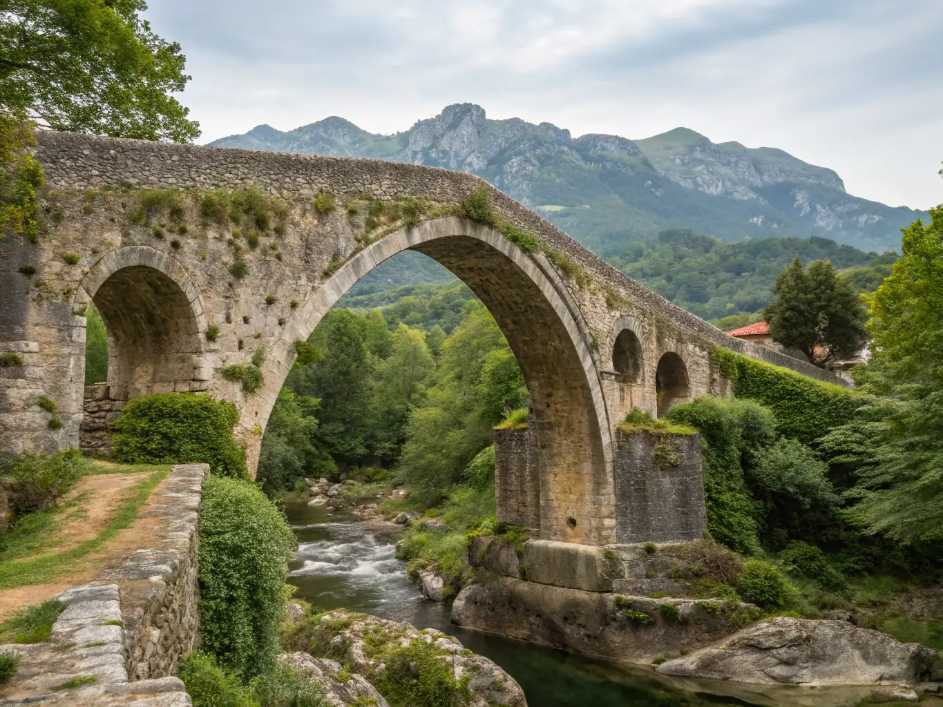 A beautifully restored ancient stone bridge in Les Mars, showcasing the association's commitment to preserving historical landmarks.