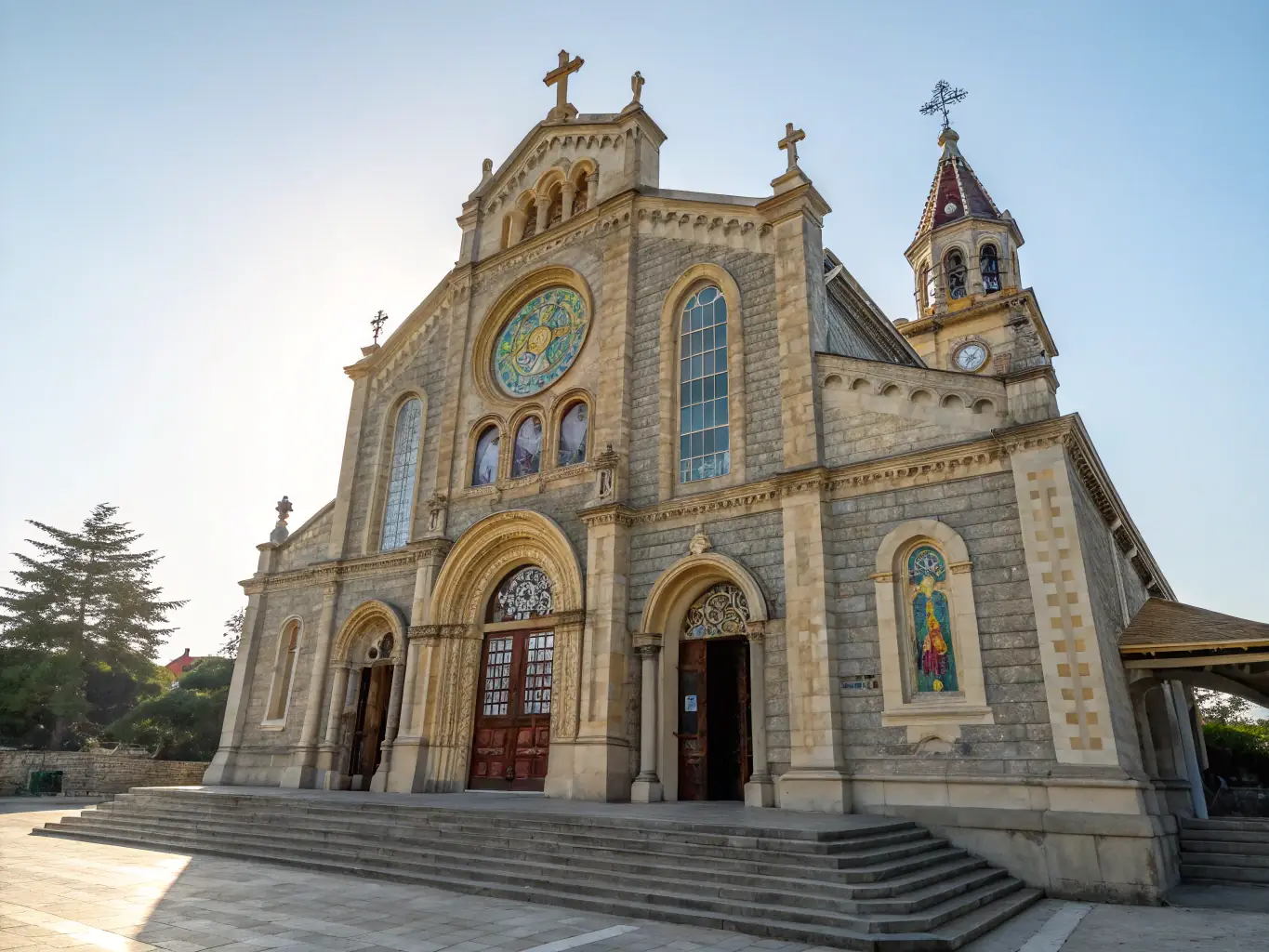 A photograph showing the conservation of a historic church facade in Les Mars, highlighting the architectural details and the careful cleaning process.